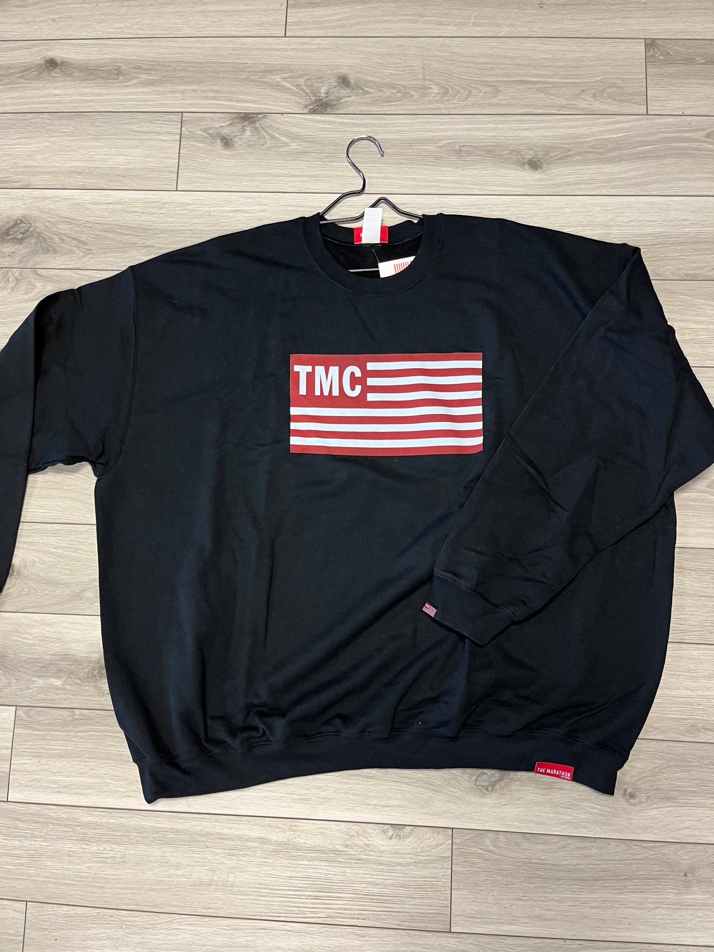 'THE MARATHON' TMC FLAG CREWNECK BLACK